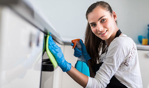 beautiful-young-woman-protective-gloves-cleaning-oven-with-rag_231208-551 (1)_edited.jpg