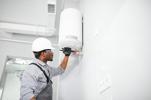 african-american-worker-set-up-gas-heating-boiler-home_255667-72846.jpg