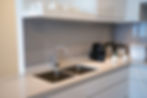 minimalistic-kitchen-corner-with-appliances_1262-12369