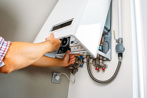plumber-attaches-trying-fix-problem-with-residential-heating-equipment-repair-gas-boiler_9