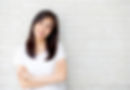 Woman smiling comfortably, suggesting relief after dental treatment and encouraging dental care for tooth pain