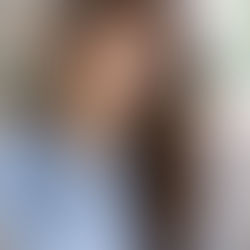 Person experiencing discomfort when biting down on one side of the mouth