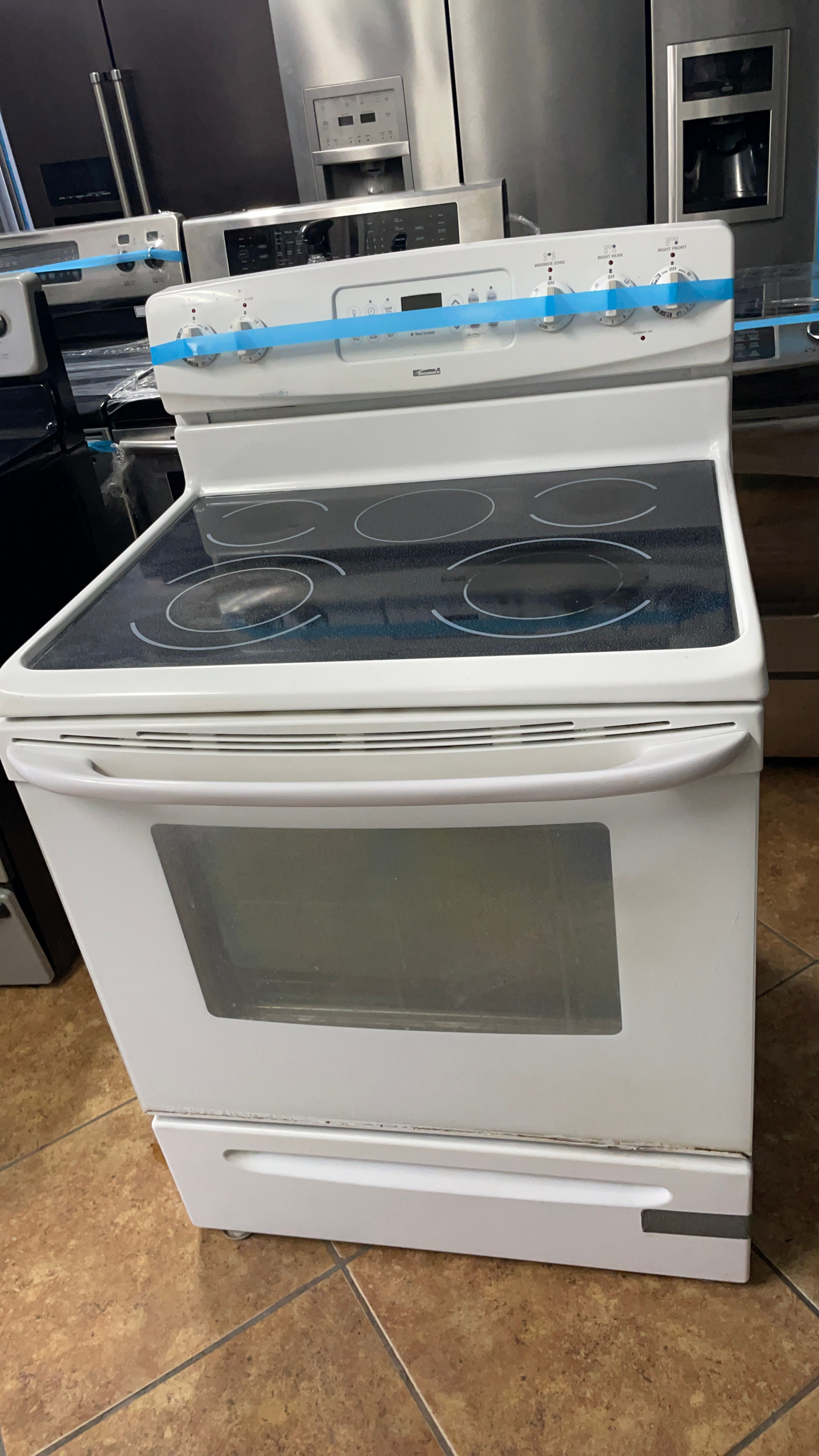 Used 30 inch Kenmore glass top white basic Stove
