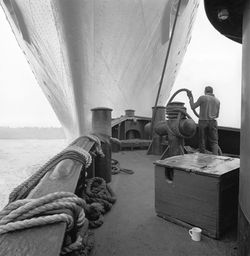 Ollie Woodcock, deckhand, tug Julia C. Moran, Hudson River, New York, New York, 1975