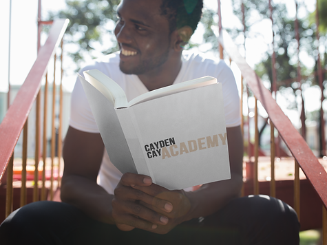 young-black-man-holding-a-paperback-book