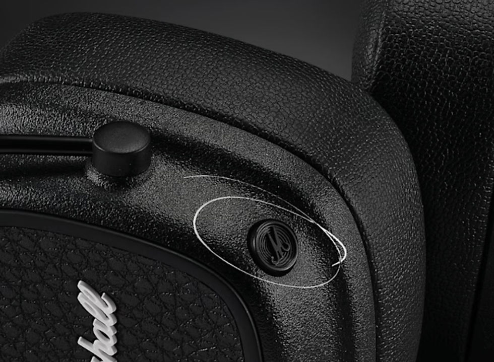 Close-up view of Marshall Major IV headphones on a wooden table
