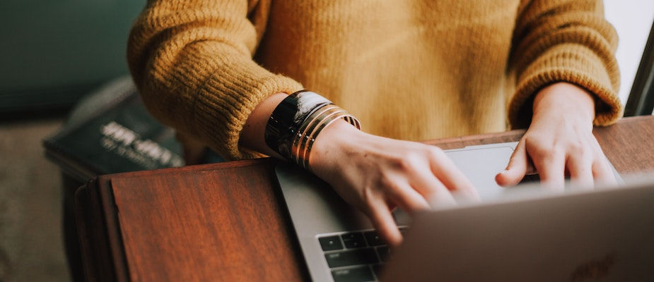 Person typing on the computer
