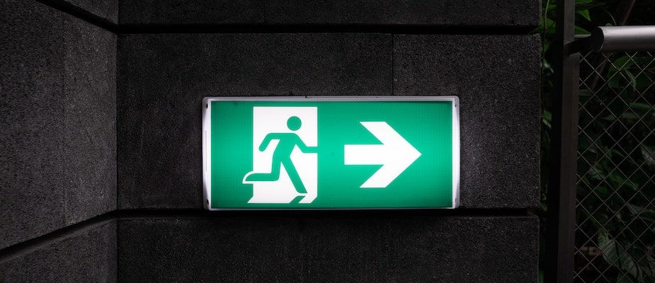 Customer Churn Explained with an image of a person leaving