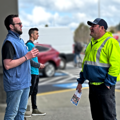 UFCW 367 member talking to a customer about what grocery workers are fighting for