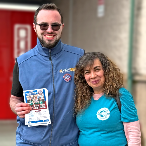 UFCW 367 members standing outside of a store with flyers
