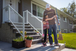 Habitat Family in front of House
