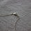 Thumbnail: Close up of silver lobster, clasp, and chain.
