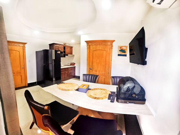 2BR GUESTHOUSE VILLA - Living room with kitchen. Philippines Paradise Beachfront Hotel.
