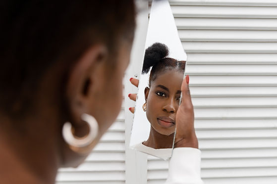 portrait-young-woman-dressed-white-posing-mirror.jpg