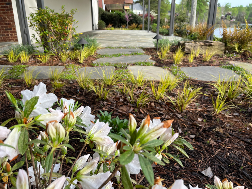 stone walkway to lakeside firepit