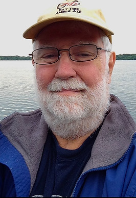 greg on boat.jpg