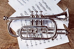 silver-cornet-instrument-on-sheet-music.