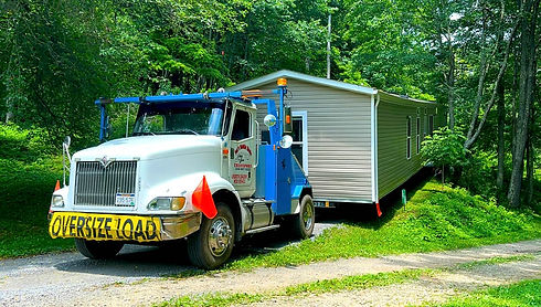Who can move mobile homes houses and do clearing land in WV, VA, TN, OH, KY and NC?