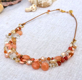 Carnelian Amber Collar Necklace on linen cloth.