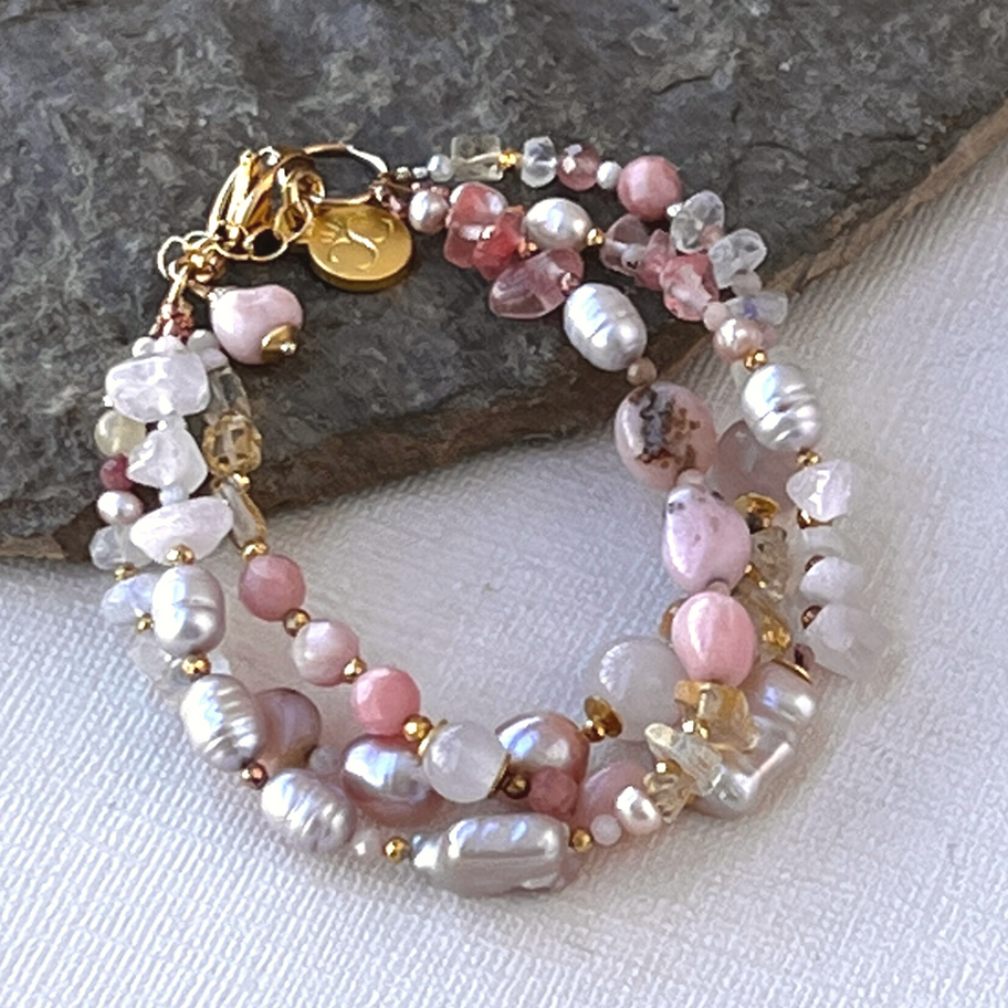 Detailed close-up of Pink Peruvian Opal and Pearl Gemstone Bracelet showing faceted opal and rose quartz nugget textures.