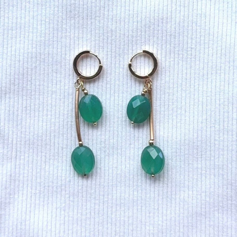 Green Onyx Gold Earrings on Linen cloth. Hero Shot.