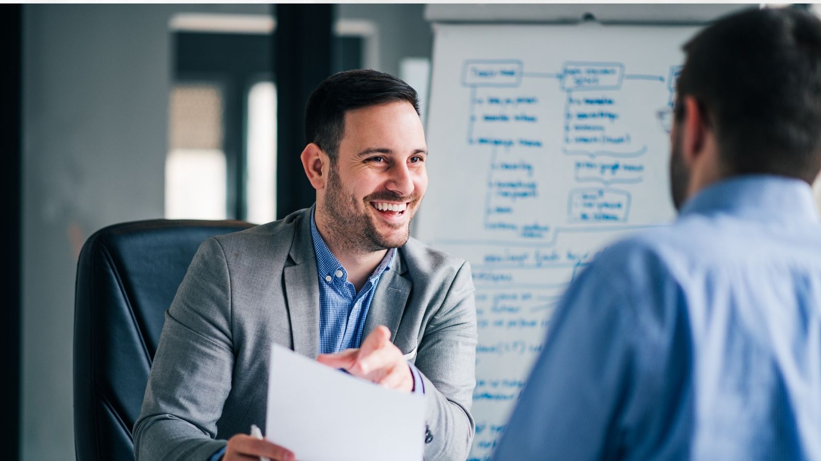 Interview candidates in person