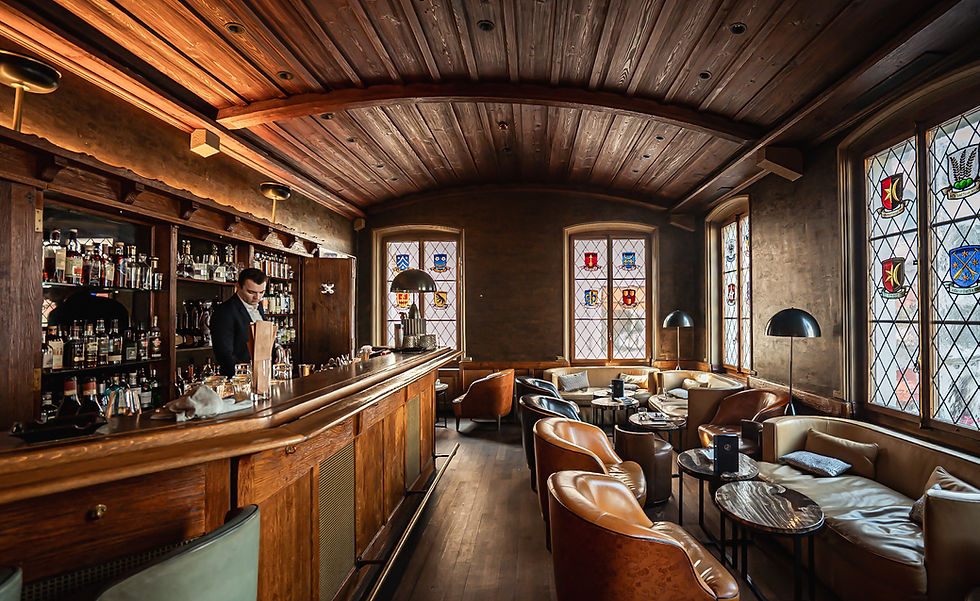 The Iconic Cigar Bar with stained glass at Storchen Zurich
