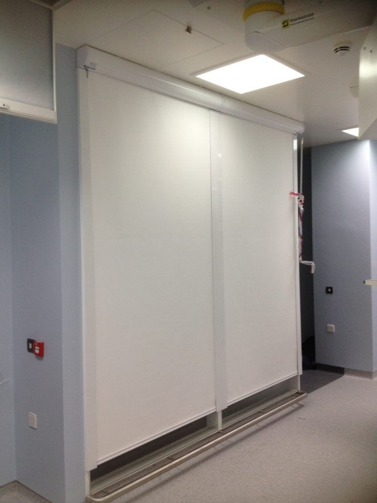 Encapsulated Chain Operated Laser Blinds used to block lasers in laboratory