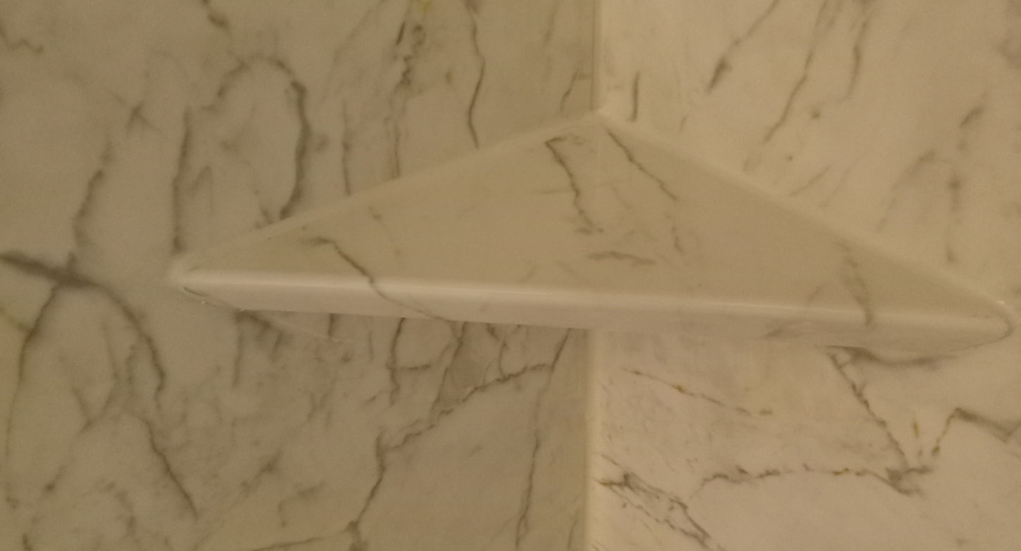 Frameless glass shower installation in Kissimmee, Florida.