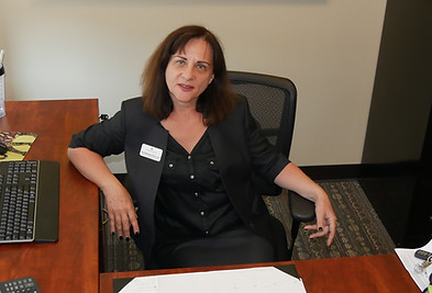 Photo of accountant at her desk