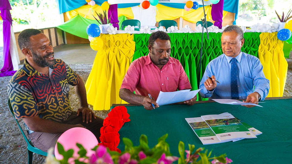Signing of the Letter of Intent: Prof. Ora Renagi, Vice Chancellor, Papua New Guinea University of Technology (PNGUoT); Mr. Willie Pilailo, CEO, Markham District Development Authority (MDDA); and Mr. Hosea Mailil, Agri-Partnership Manager, Grow PNG, officiate the partnership between their respective organizations.