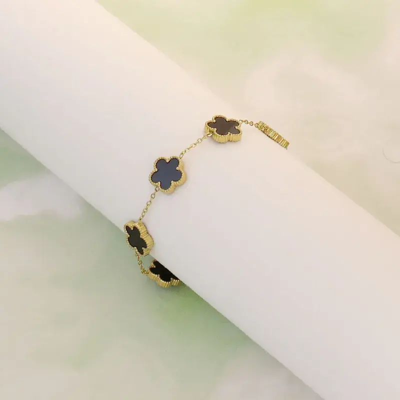 Thumbnail: Black Acrylic Plum Blossom Gold Stainless Steel bracelet