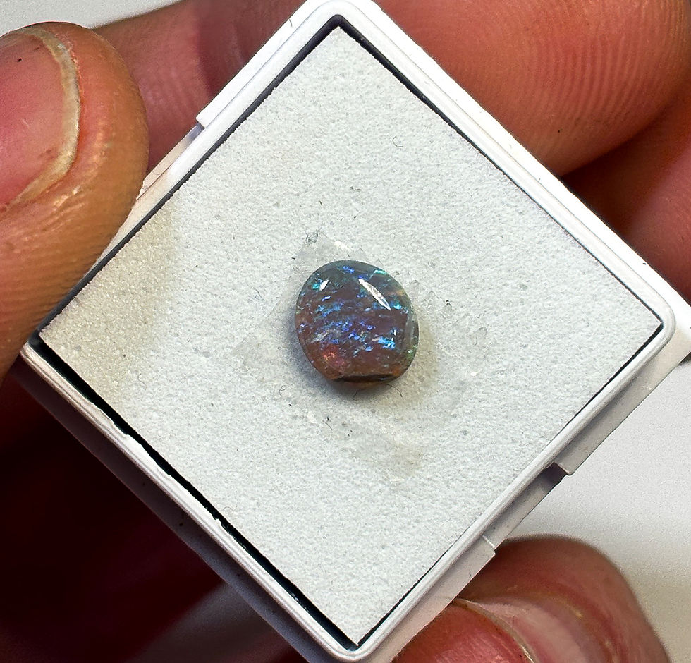 0.75 carat Lightning Ridge Semi Black Oval Opal - Eo-1093