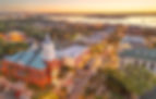 aerial-of-downtown-fernandina-beach-with-church-and-marina-under-sunset-sky-amelia-island.