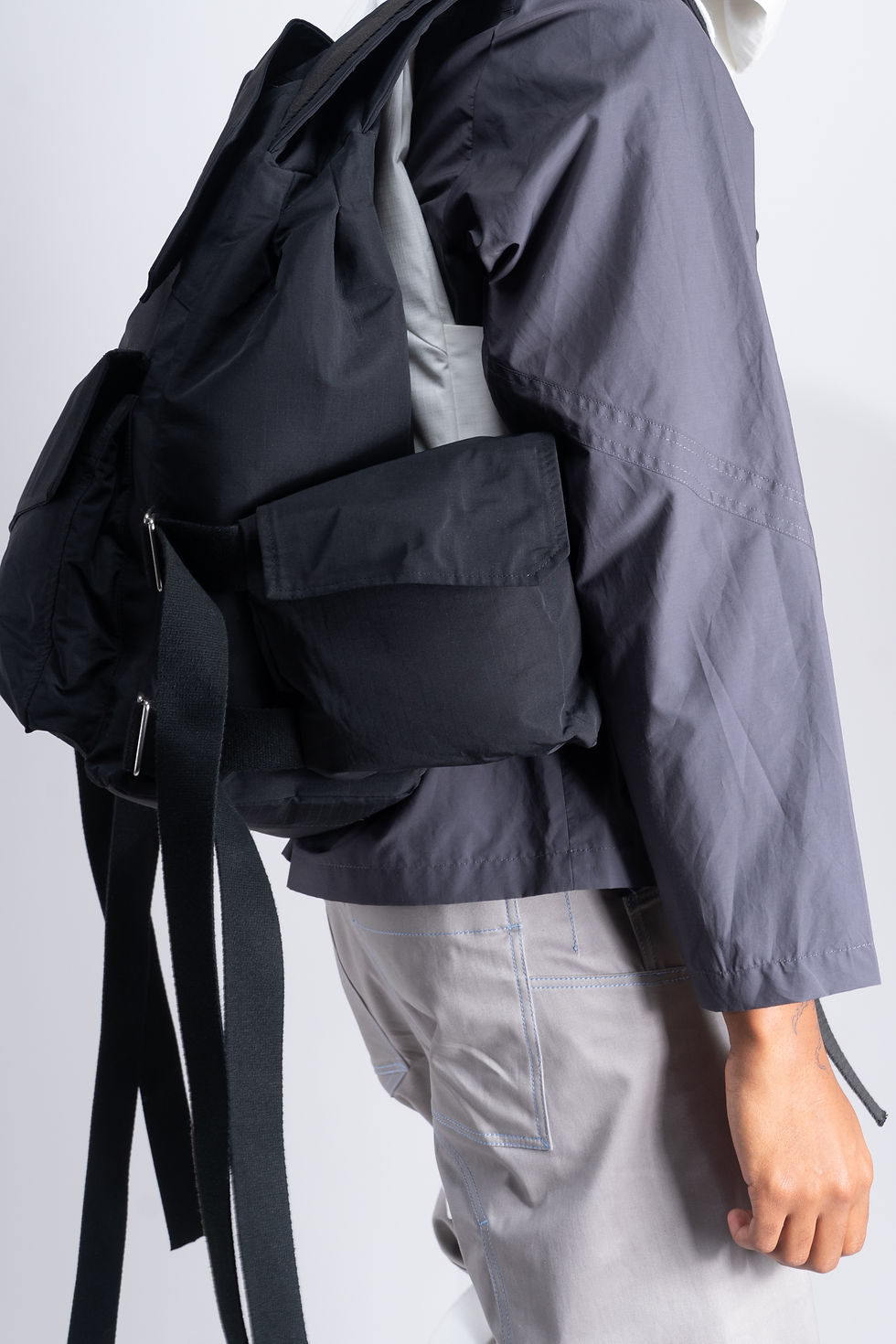 asymmetrical backpack multi pocket and adjustable strap