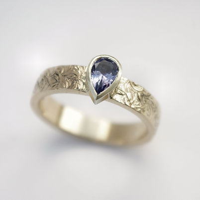 Tanzanite pear 9ct yellow and white gold ring