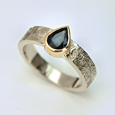 Blue Sapphire pear 9ct white gold ring