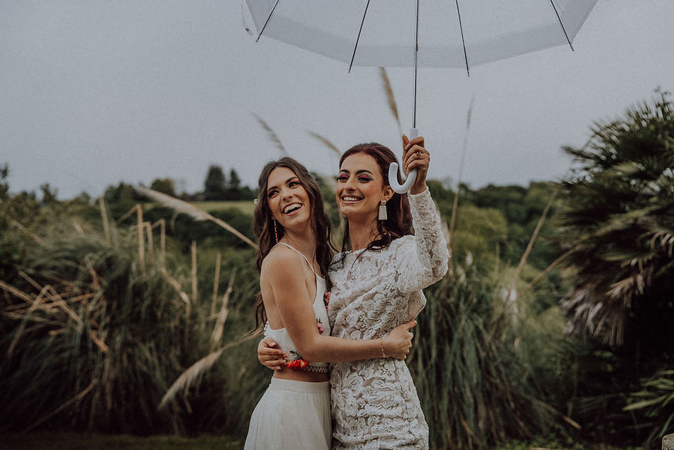 Married couple in the rain at Domaine O Petit BOnheur by GaranceRX