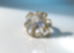 Annasach The Arwen ring, front-facing view showing layered petal construction in periwinkl