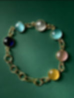 Annasach The Amara bracelet, multi-colour glass cabochons in gold-plated brass settings, f