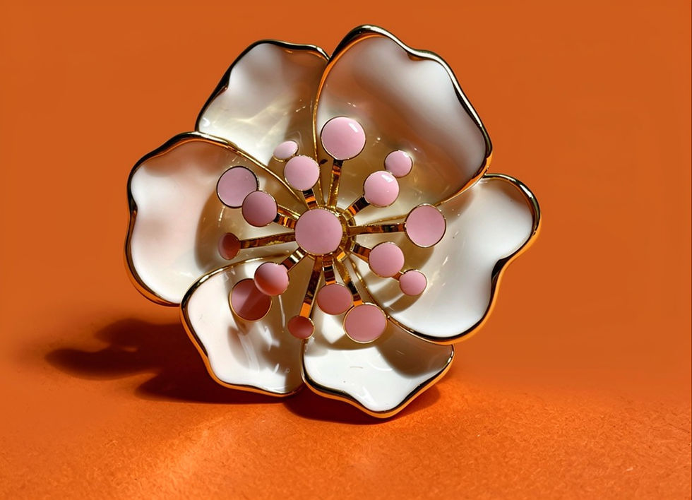 Annasach The Clara ring, ivory white enamel floral design with pink bead stamen centres, gold-plated brass band,