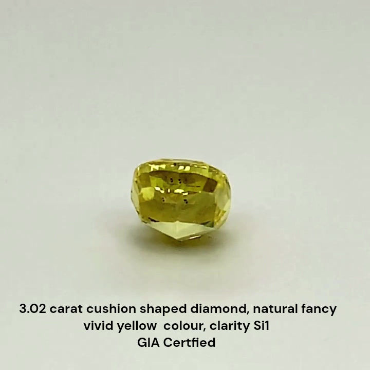 Thumbnail: 3.02 carat natural fancy vivid yellow cushion shape