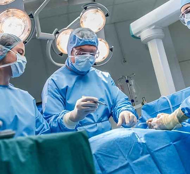Plastic surgeon performing comsetic microsurgery for the best results in facial surgery with minimal scars.