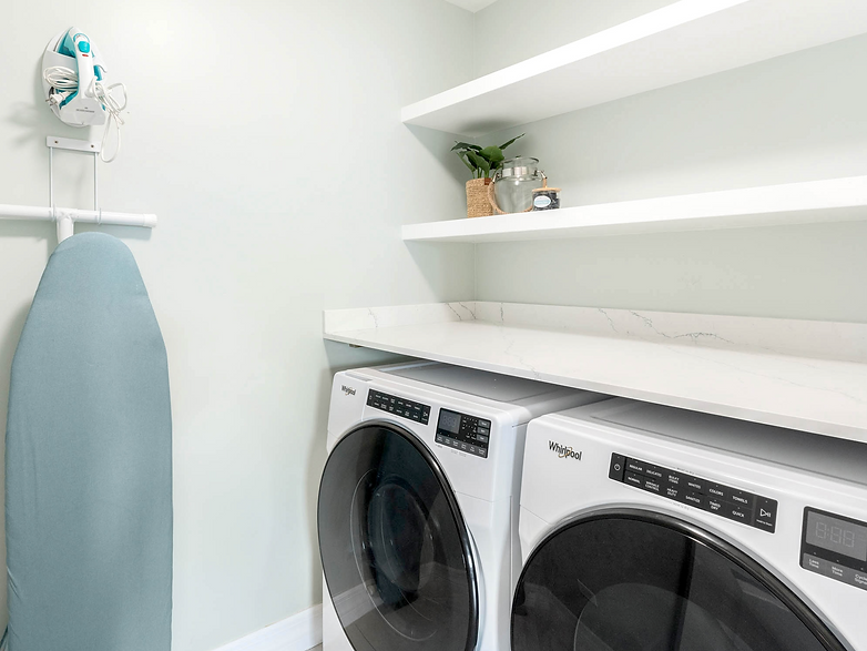 Beachcomber Grand Cayman after image of a laundry room renovation with a counter top over