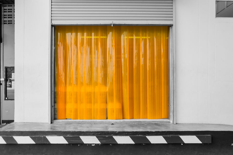 Warehouse gate loading area with PVC strip curtain or plastic strip doors..jpg