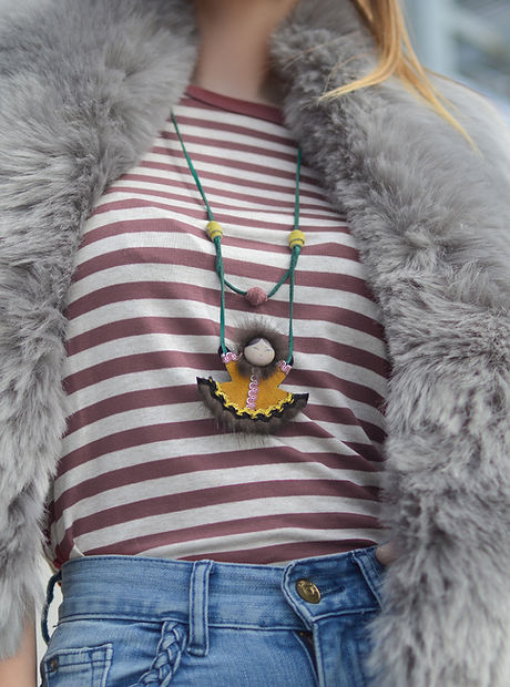 A Woman Wearing Striped Shirt