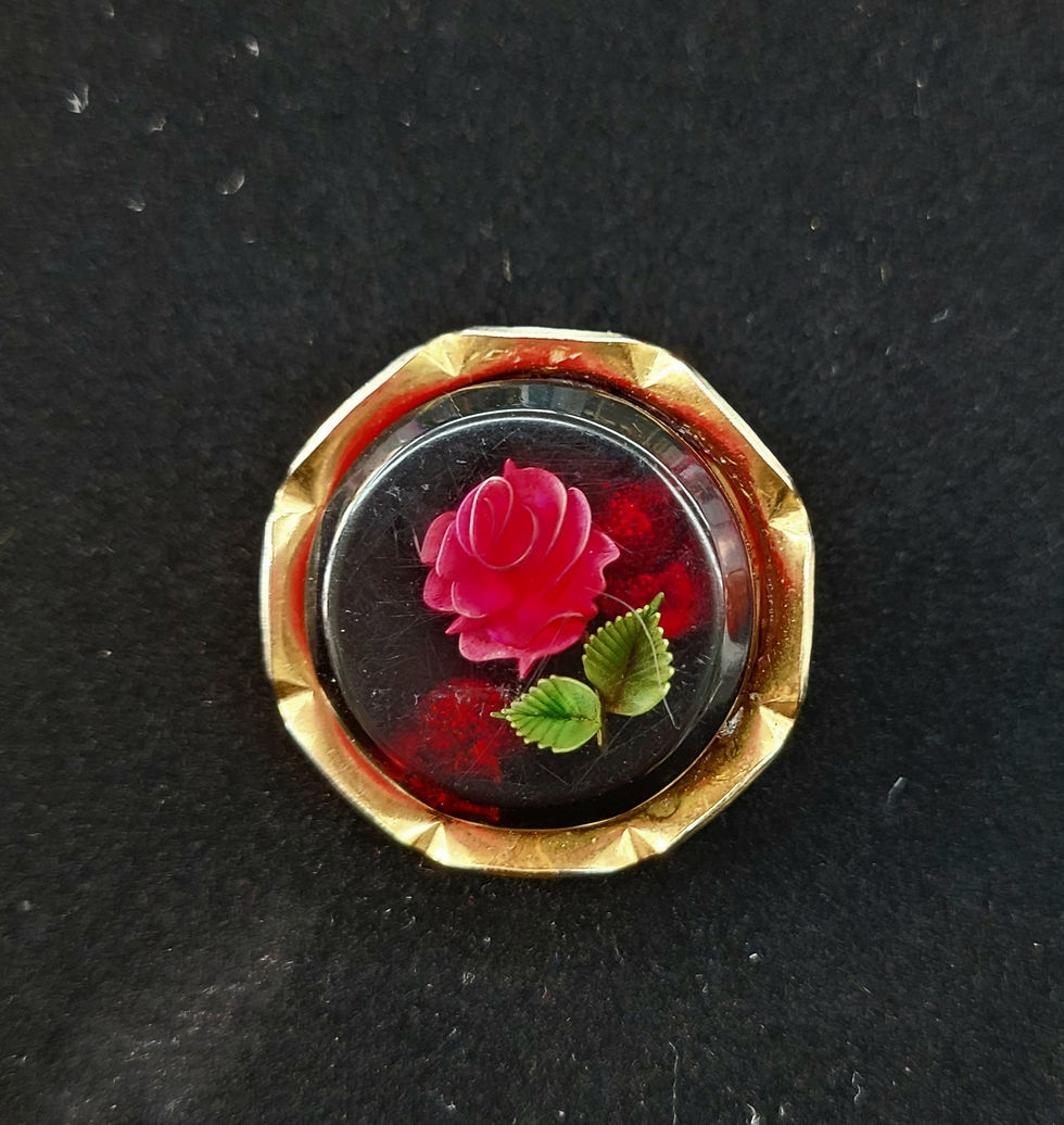 Flower under glass brooch
