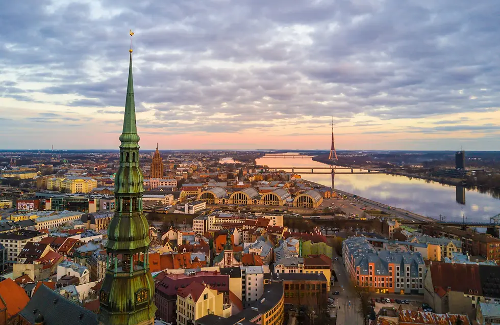 Sunset over a city in the baltics
