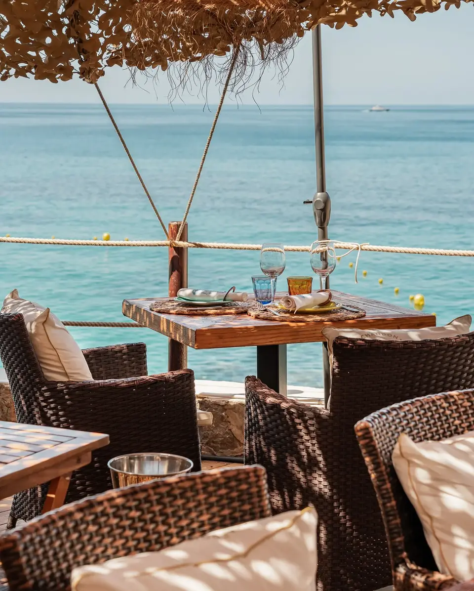 Seaside restaurant table with ocean views in Mallorca