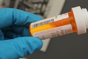Picture of white powder found in prescription pill bottle